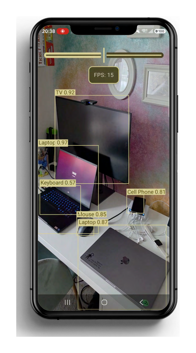 LibreYOLOXs detecting a TV, laptop, keyboard, mouse and cell phone live in the EdgeVision AI app on a Snapdragon phone